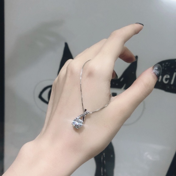 Sterling Silver Criss-Cross Stunning Simulated Diamond Silver Pendant Necklace - Picture 7 of 10